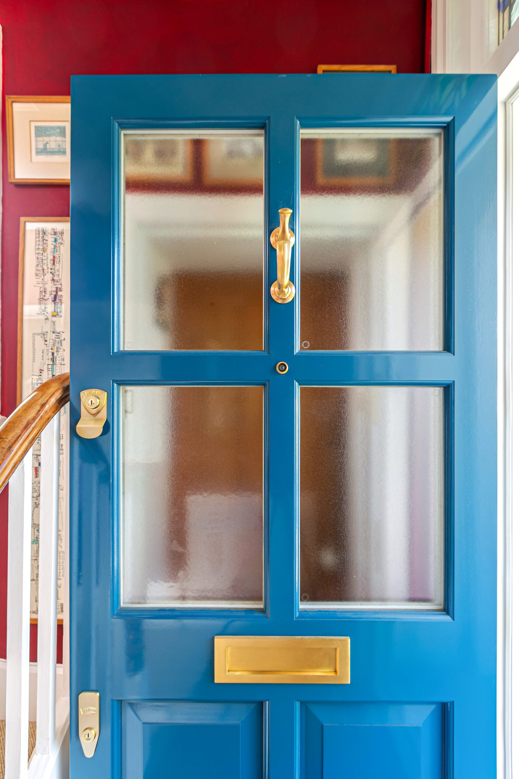 Blue front door with red interior