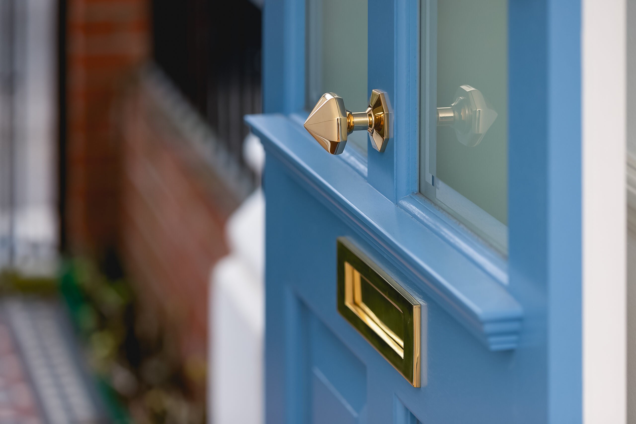 Close up of pale blue front door