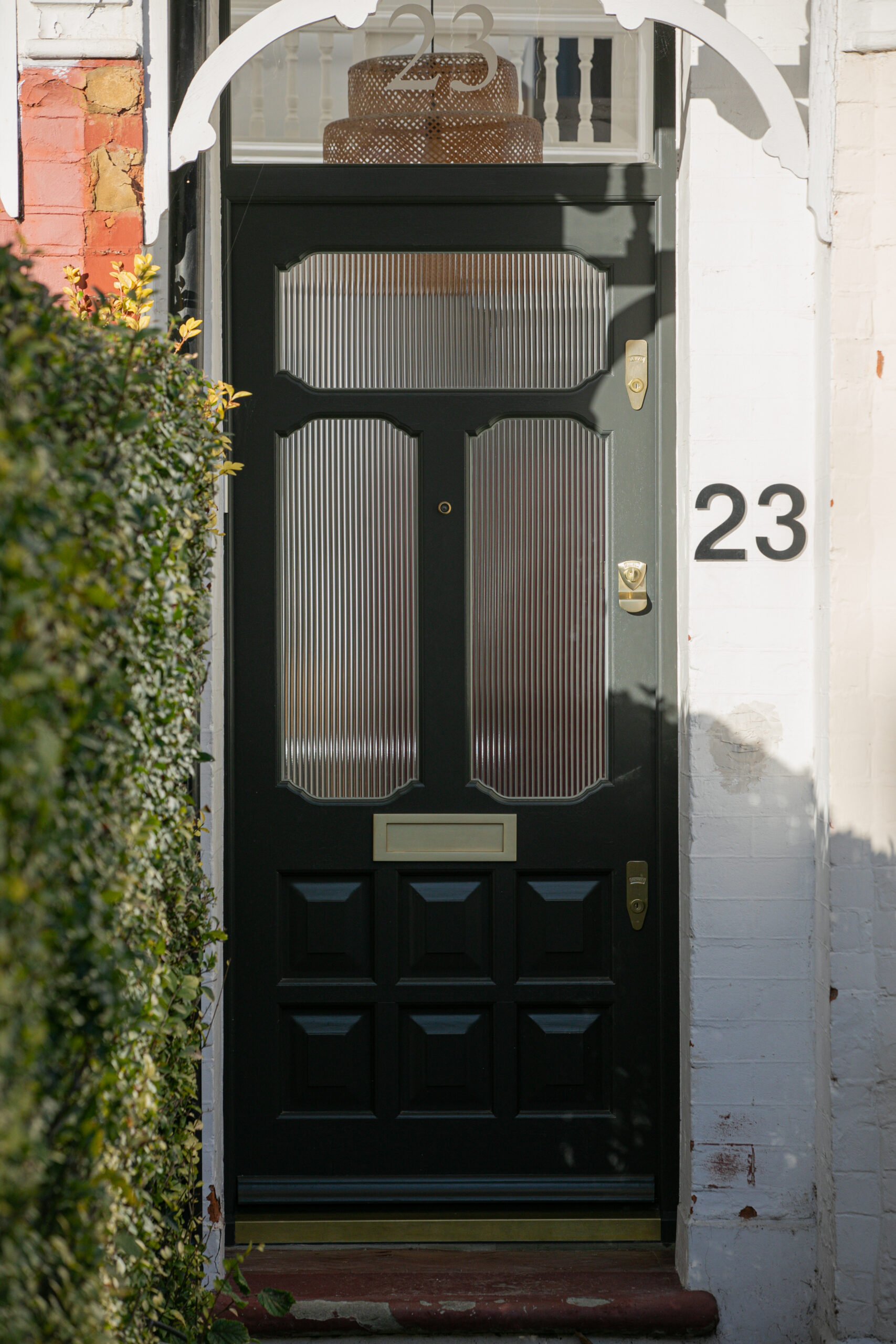 Grey front door with white contrast