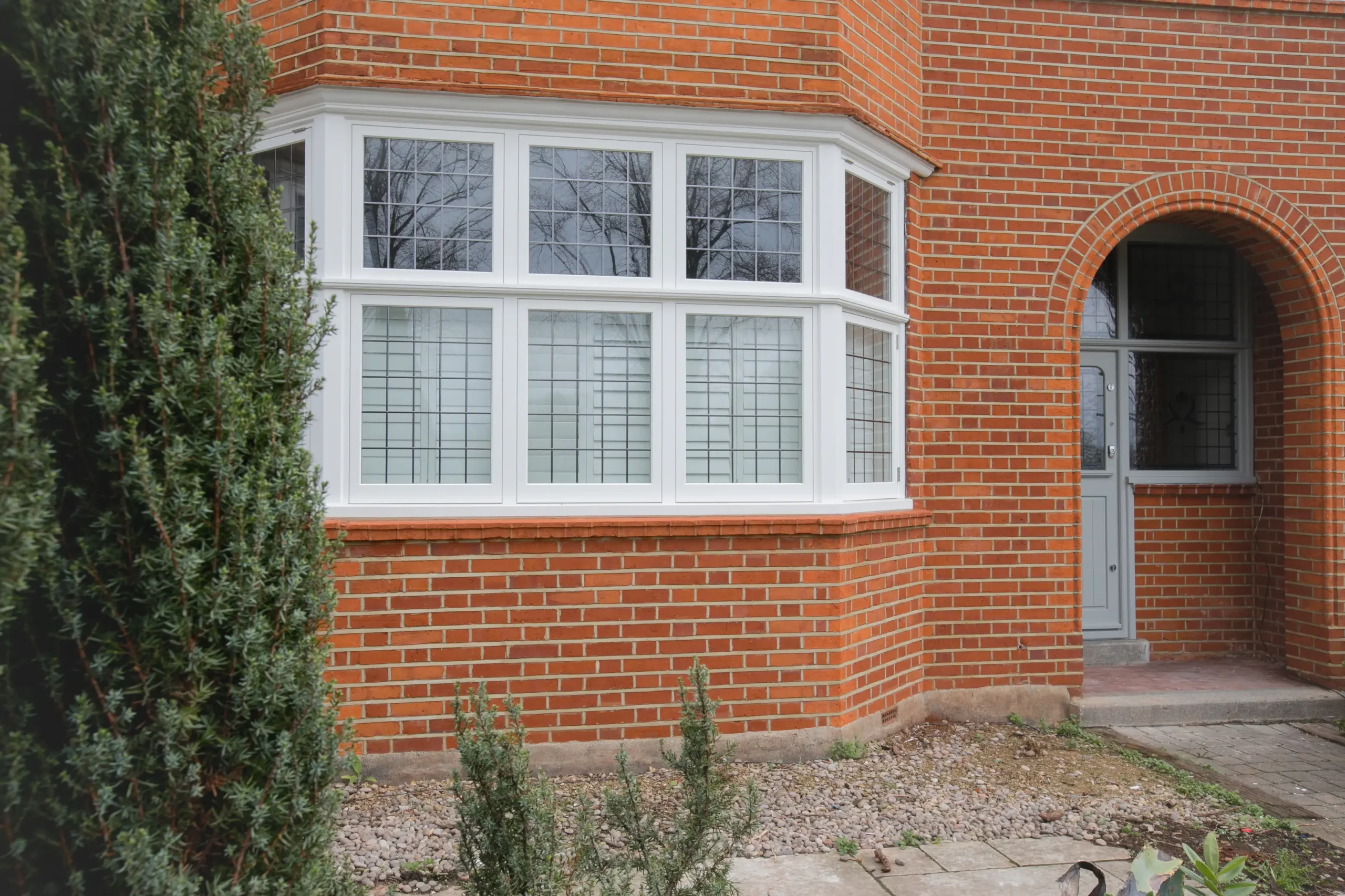 Leaded bay with white 1930s style windows