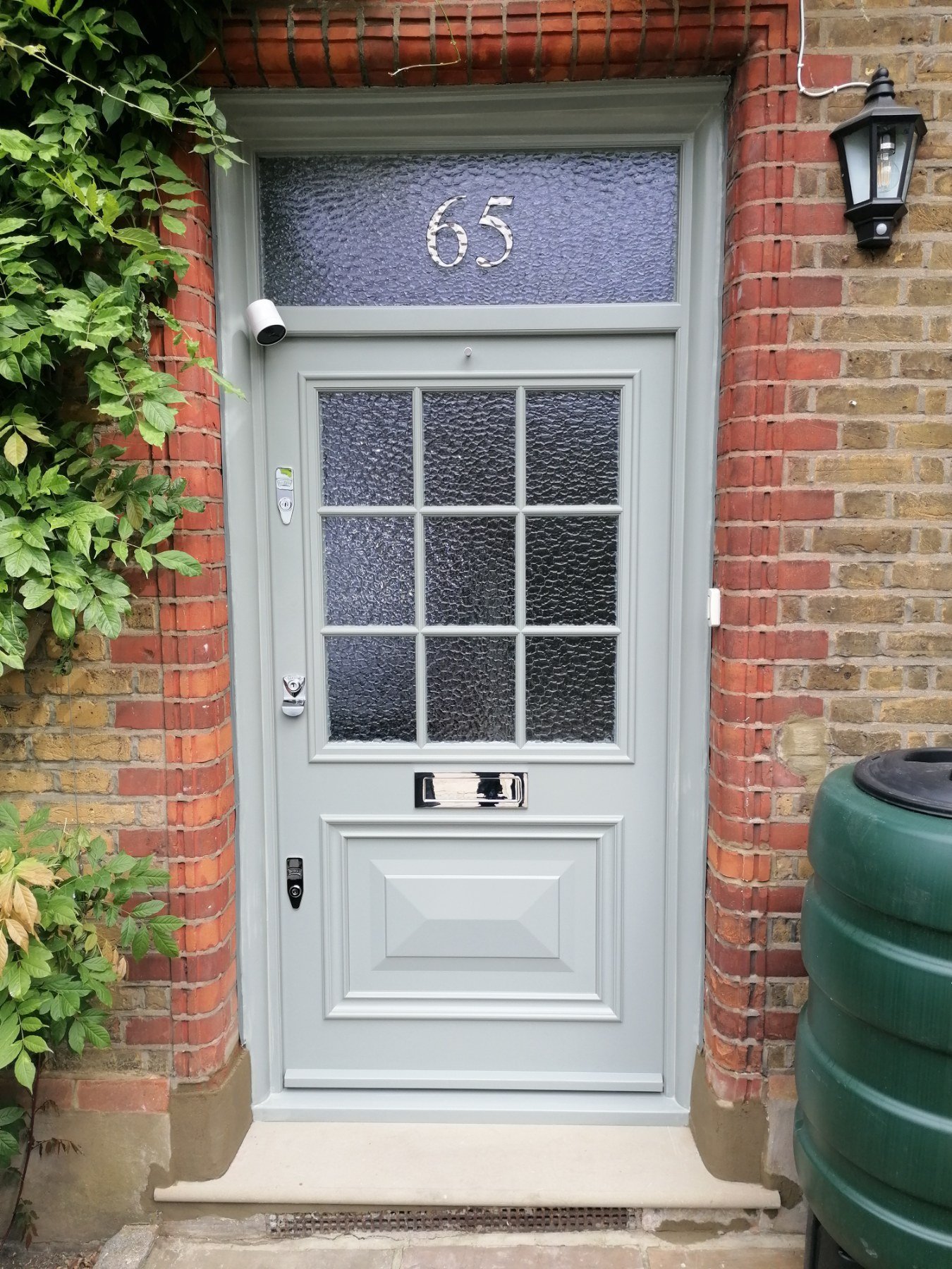 Olive 1920s front door with patterned glass