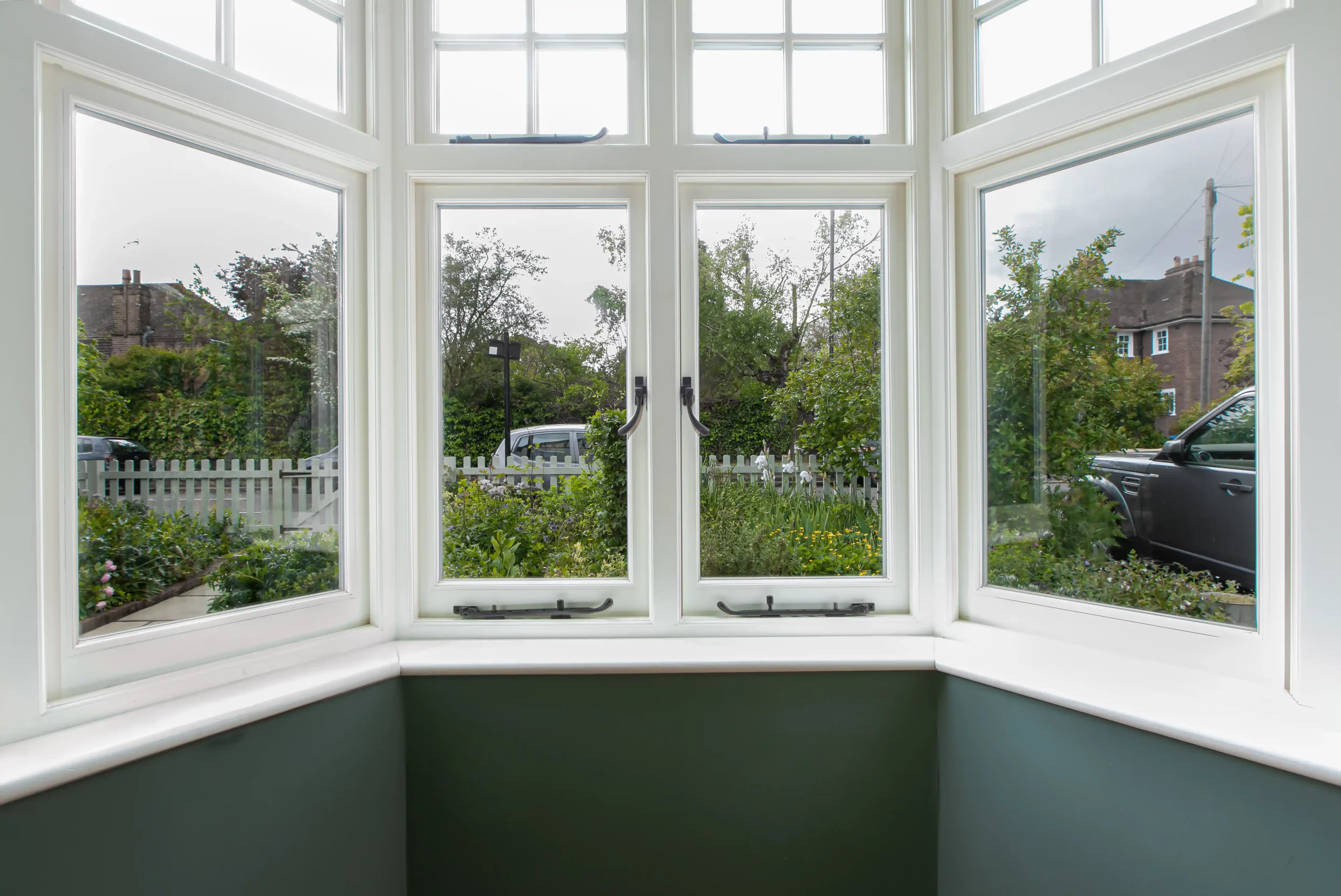 Teal room with restored 1930s windows