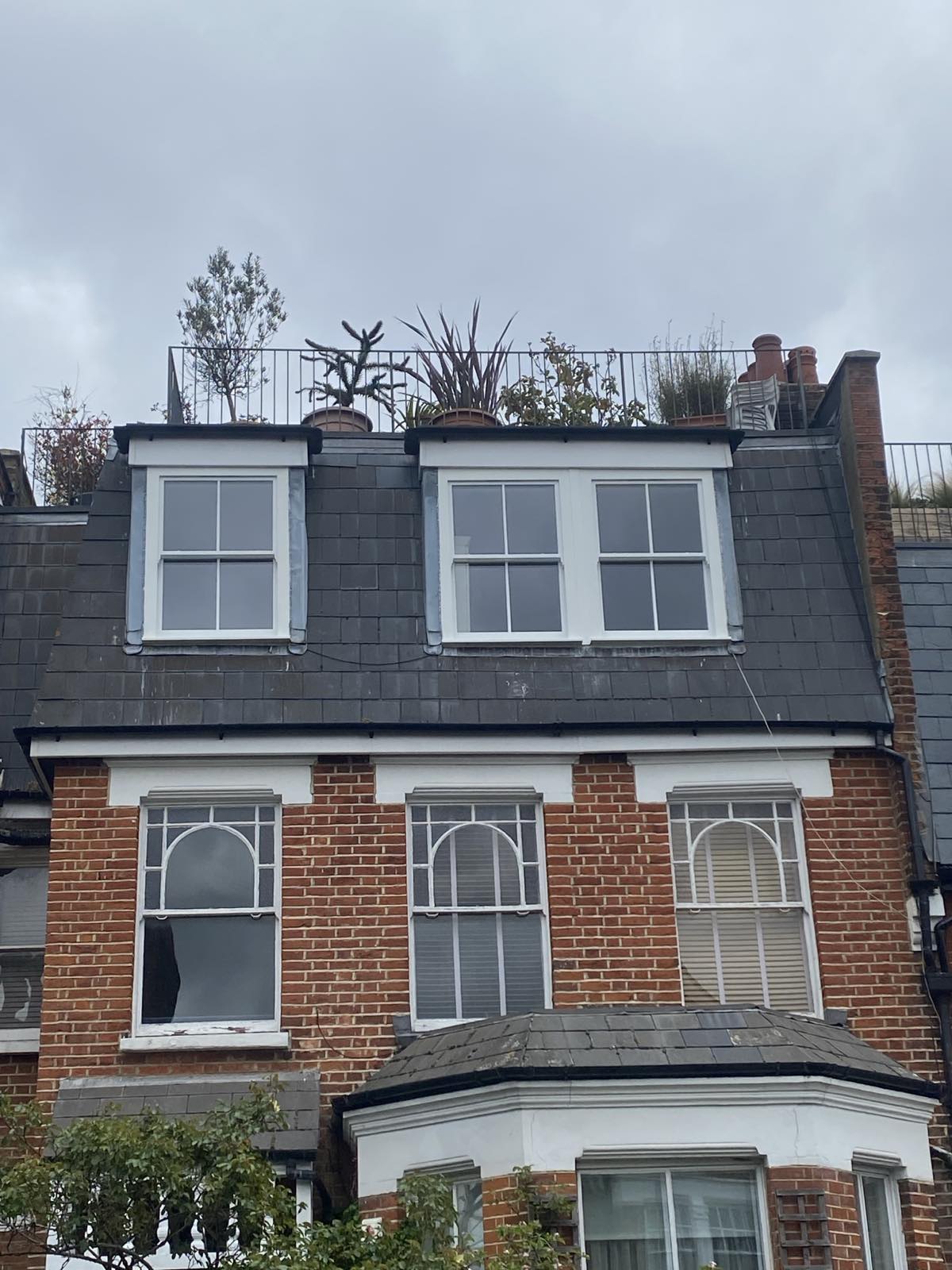 pair of slate roof dormer windows
