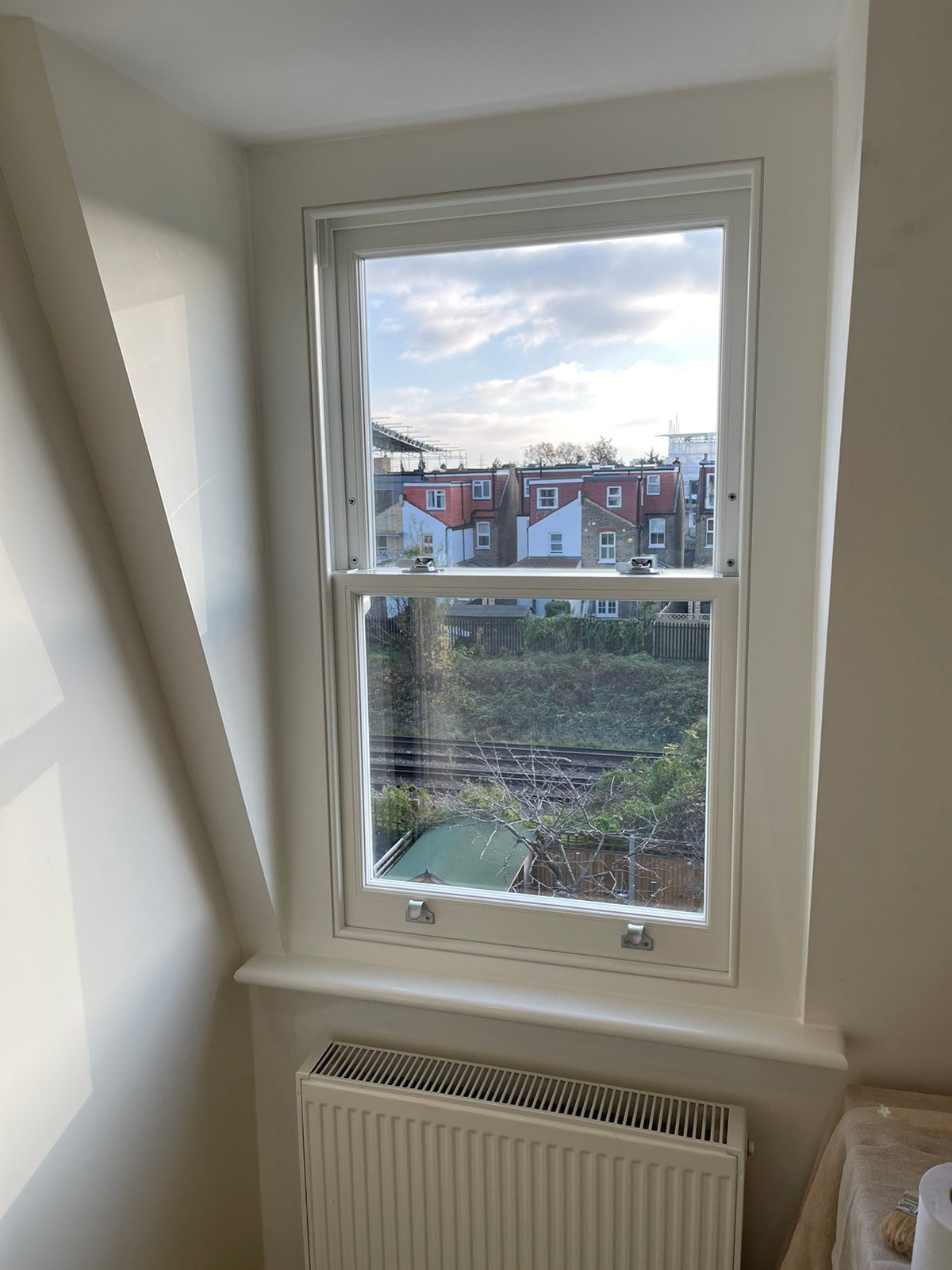 tall white dormer window interior