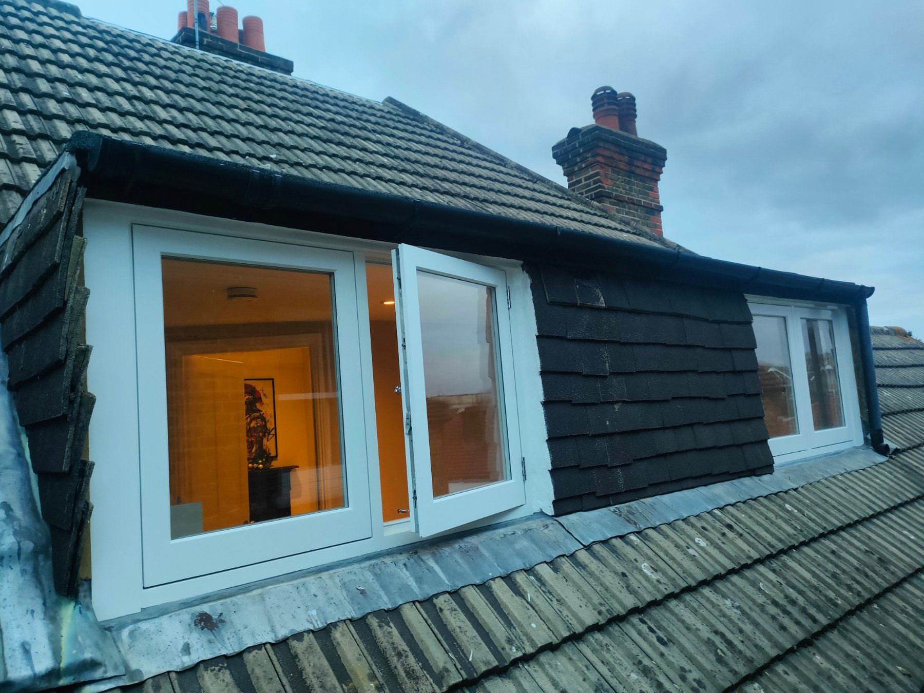 white casement dormer window exterior
