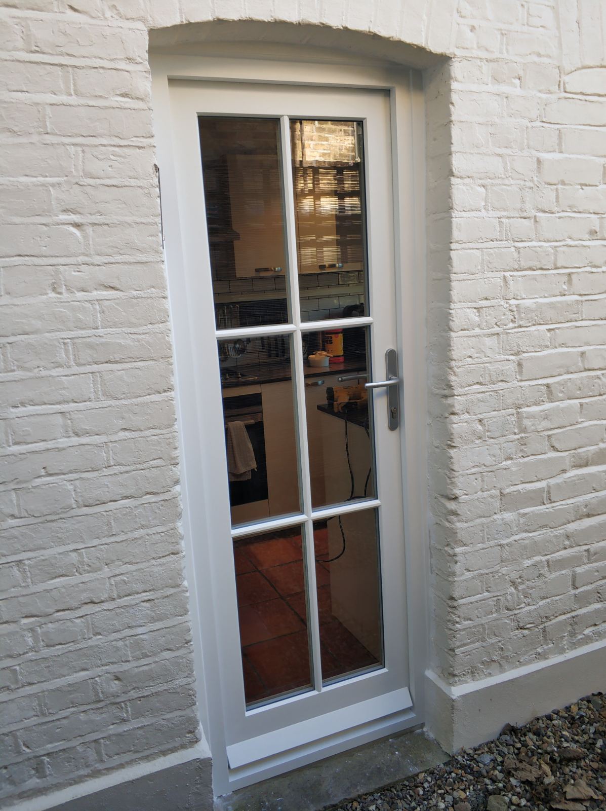 white glazed kitchen exterior door