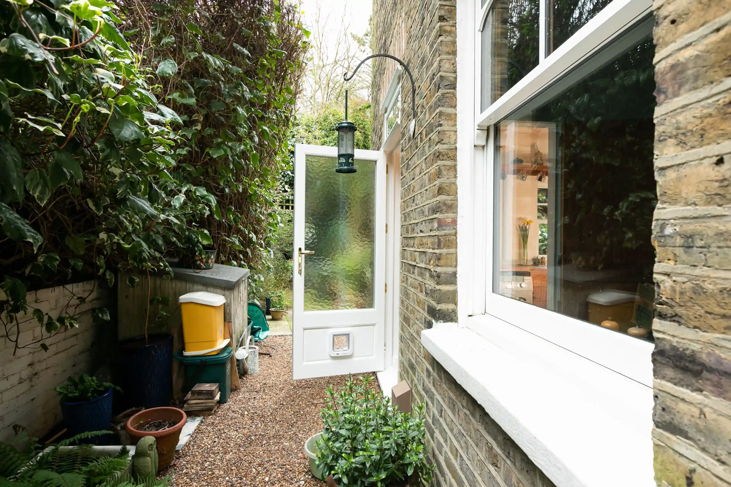 white side entrance door with frosted glass