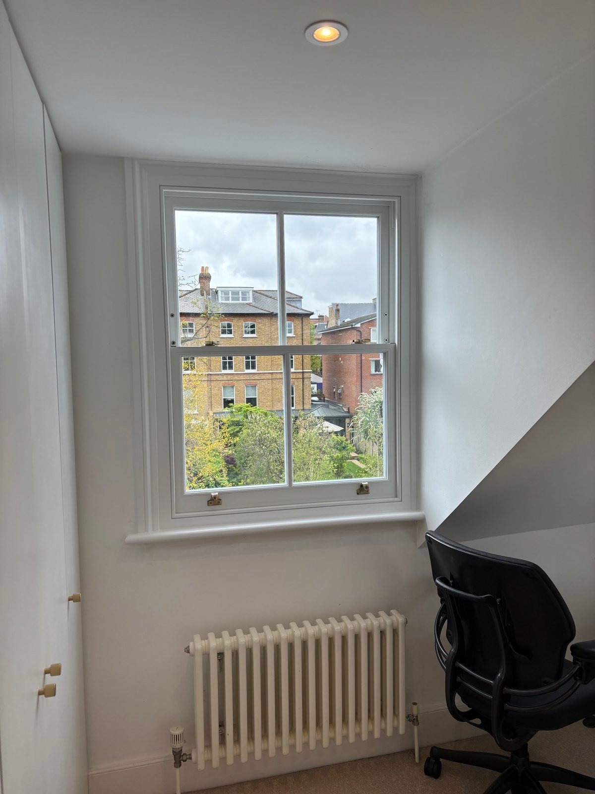 white timber dormer window in loft room