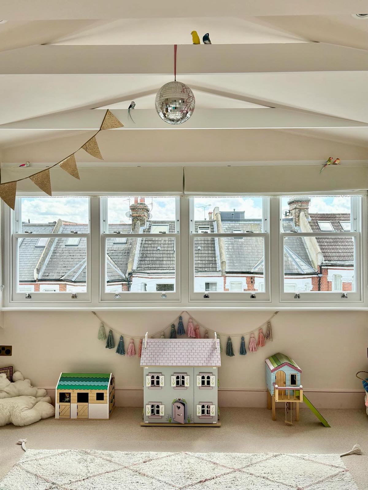 wide dormer windows in loft playroom